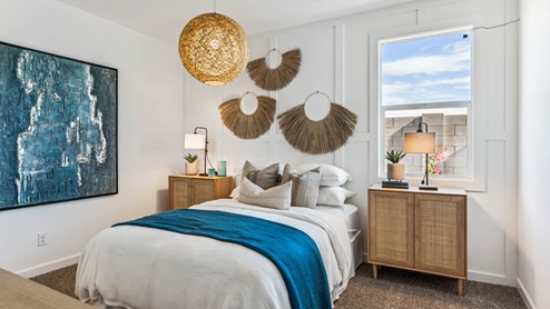A cozy guest bedroom with private bath connected