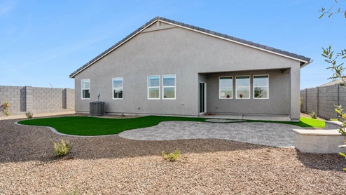 Large fenced-in backyard with a covered patio, perfect for outdoor entertaining