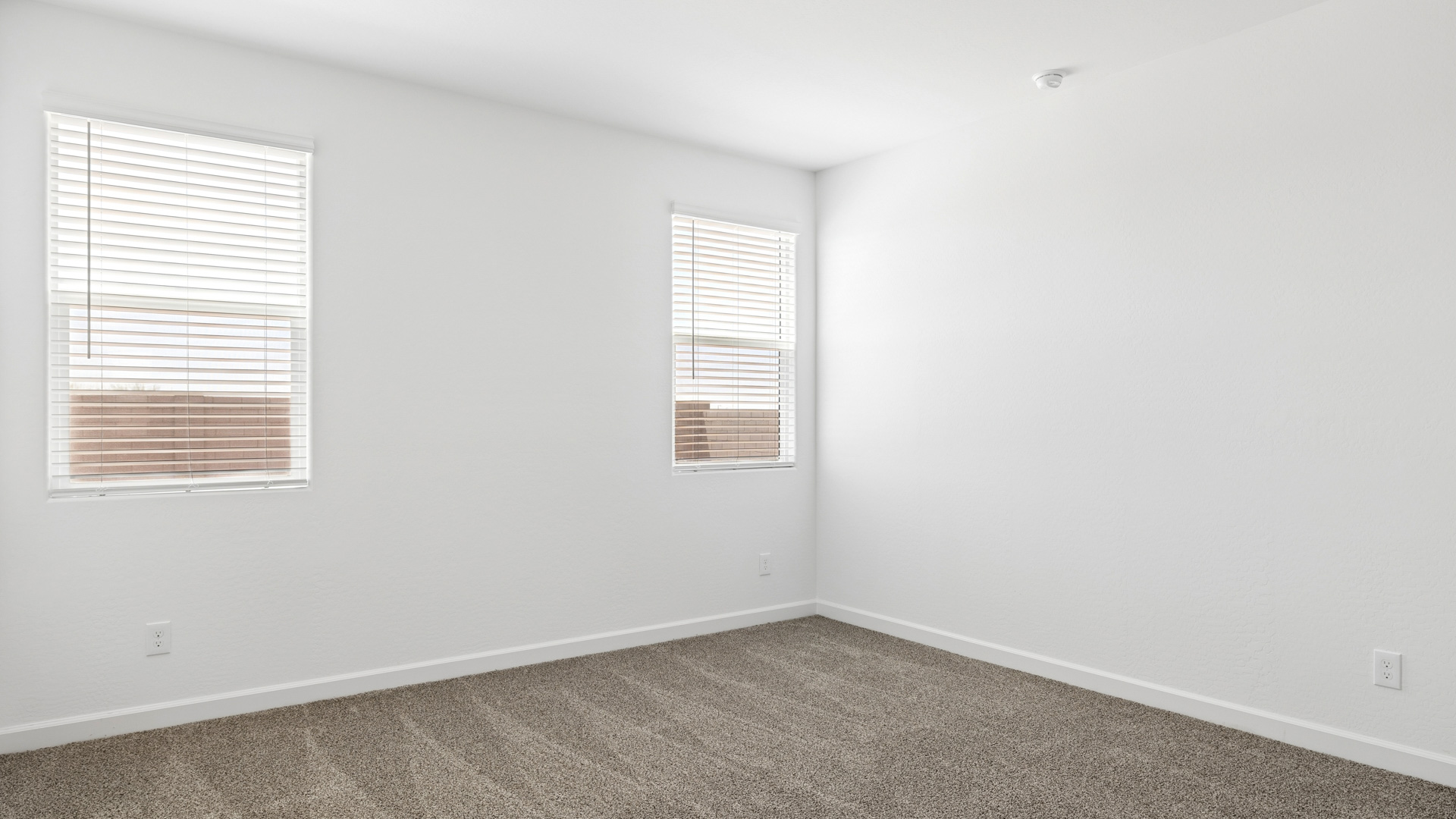 primary suite with walk in closet