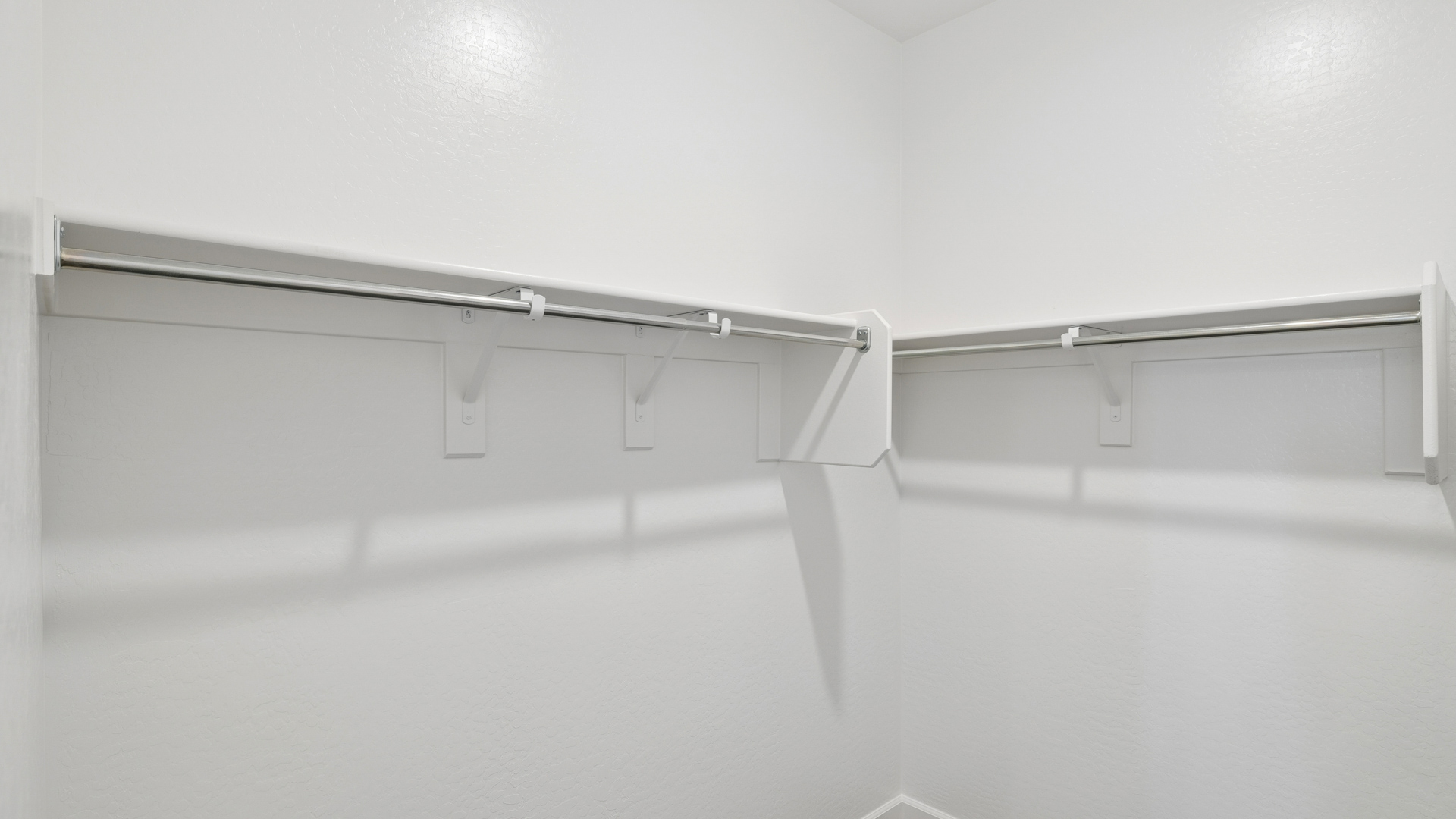 primary suite with walk in closet
