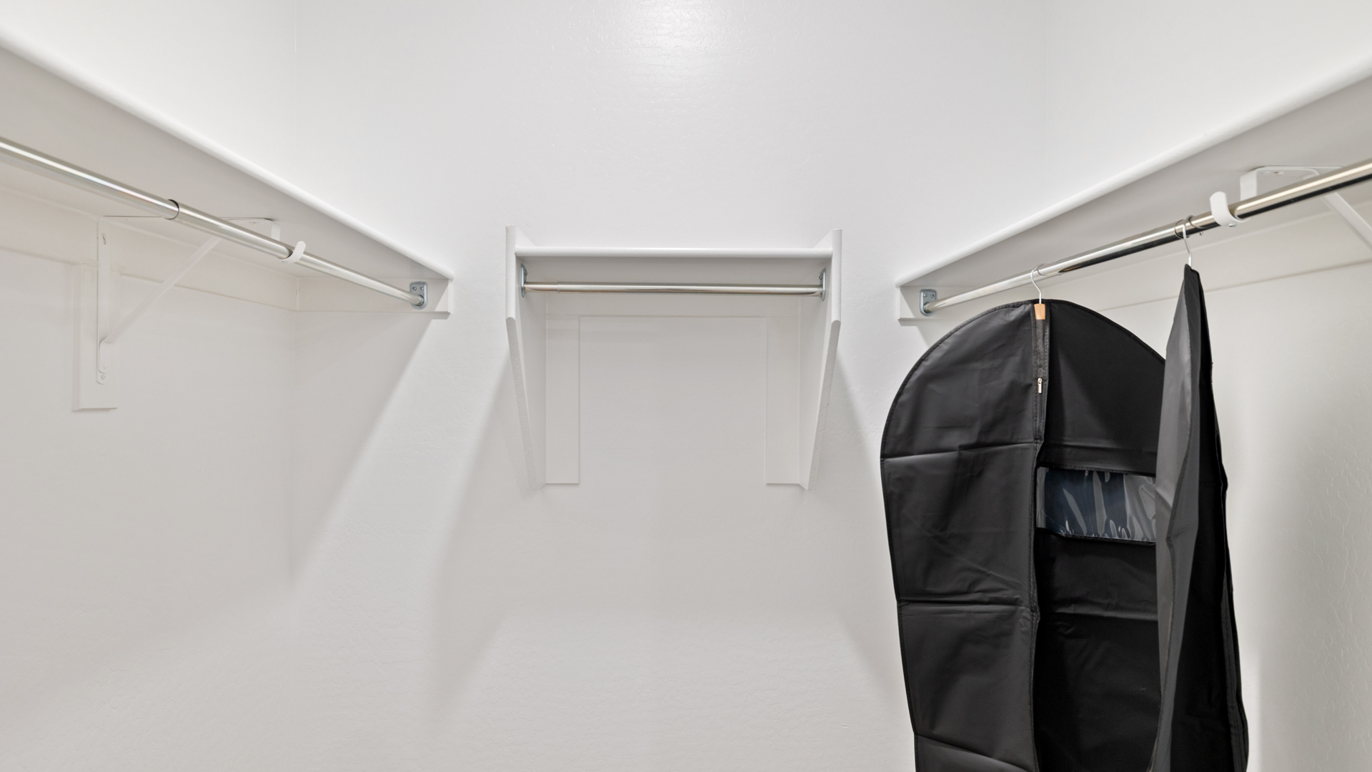primary suite with walk in closet