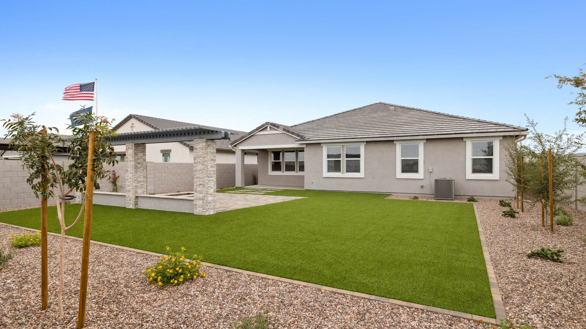 back of new home and covered patio