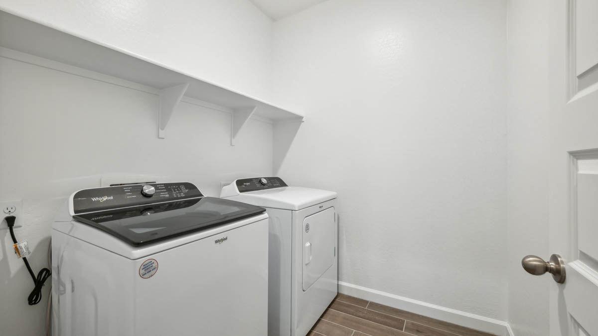 laundry room with shelving