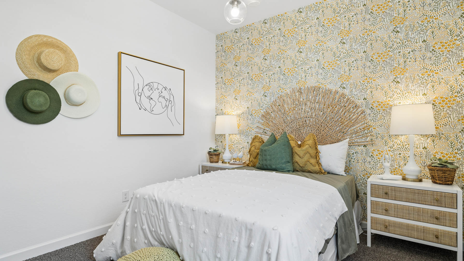 Comfortable guest bedroom featuring neutral-toned walls and a large closet.