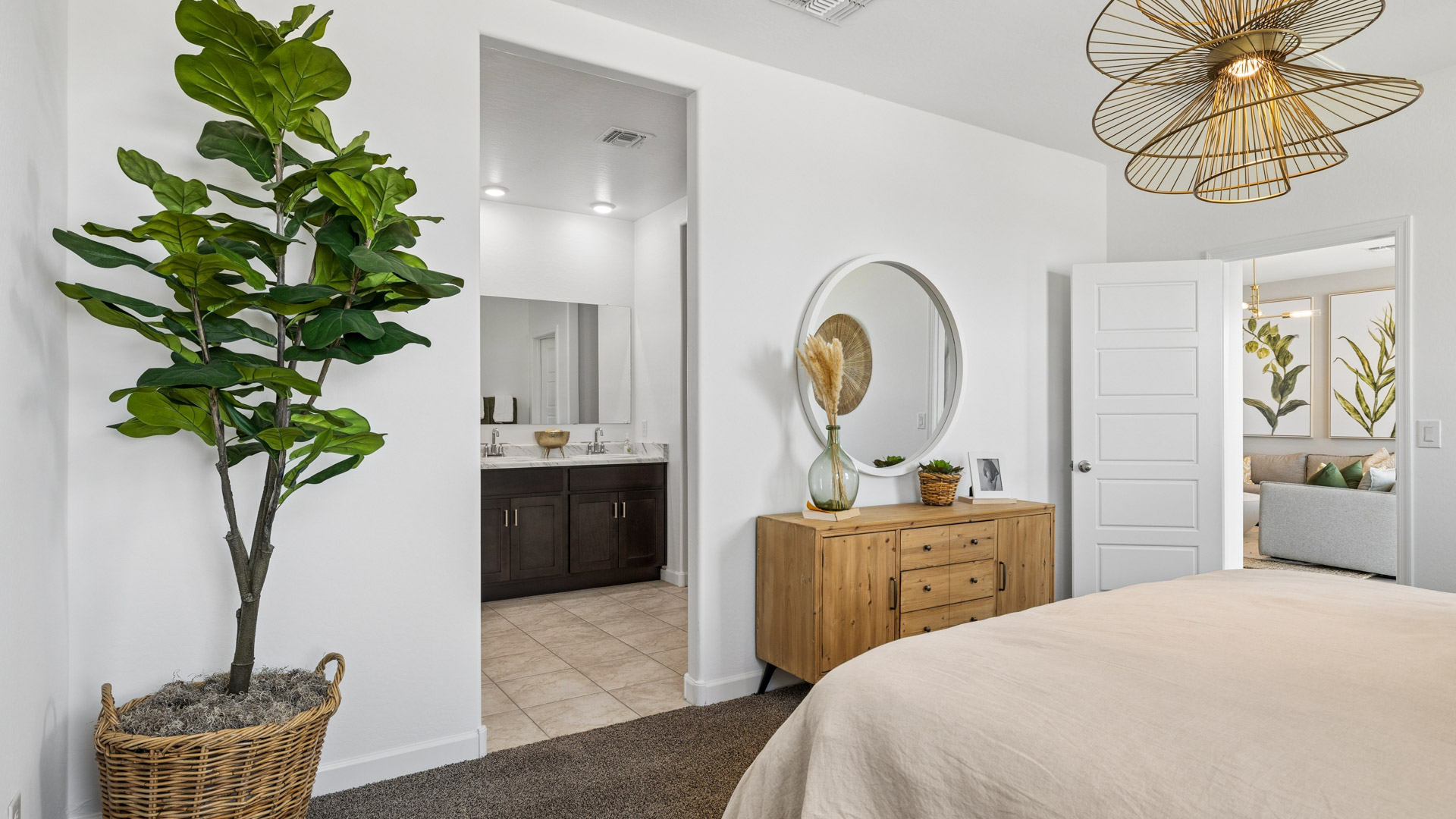 Comfortable guest bedroom featuring neutral-toned walls and a large closet.