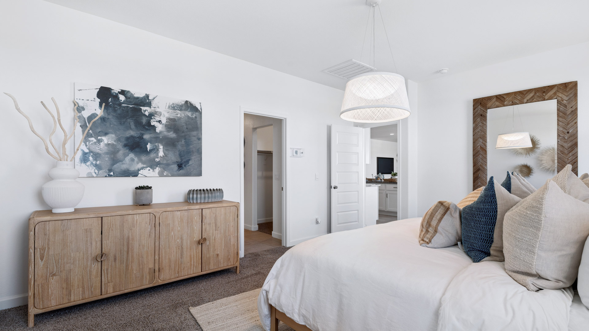 primary suite with walk in closet