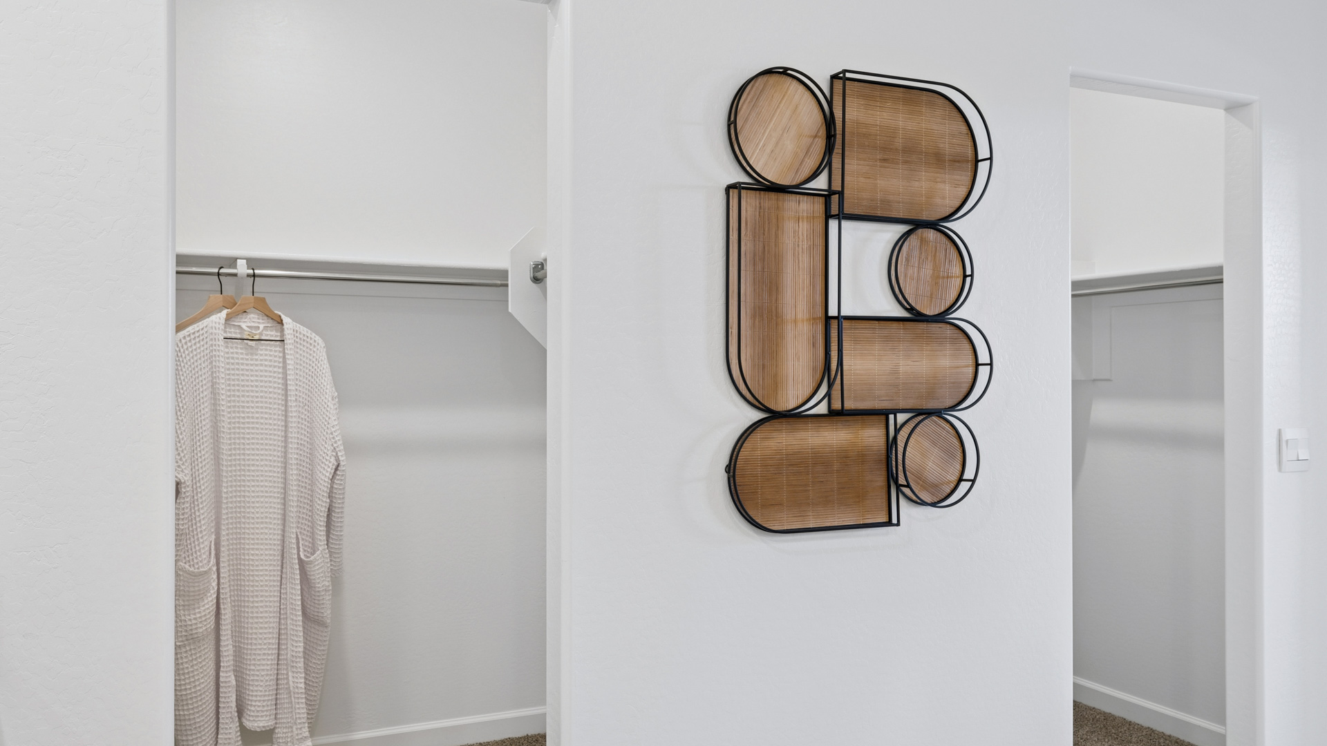 primary bathroom with dual vanities