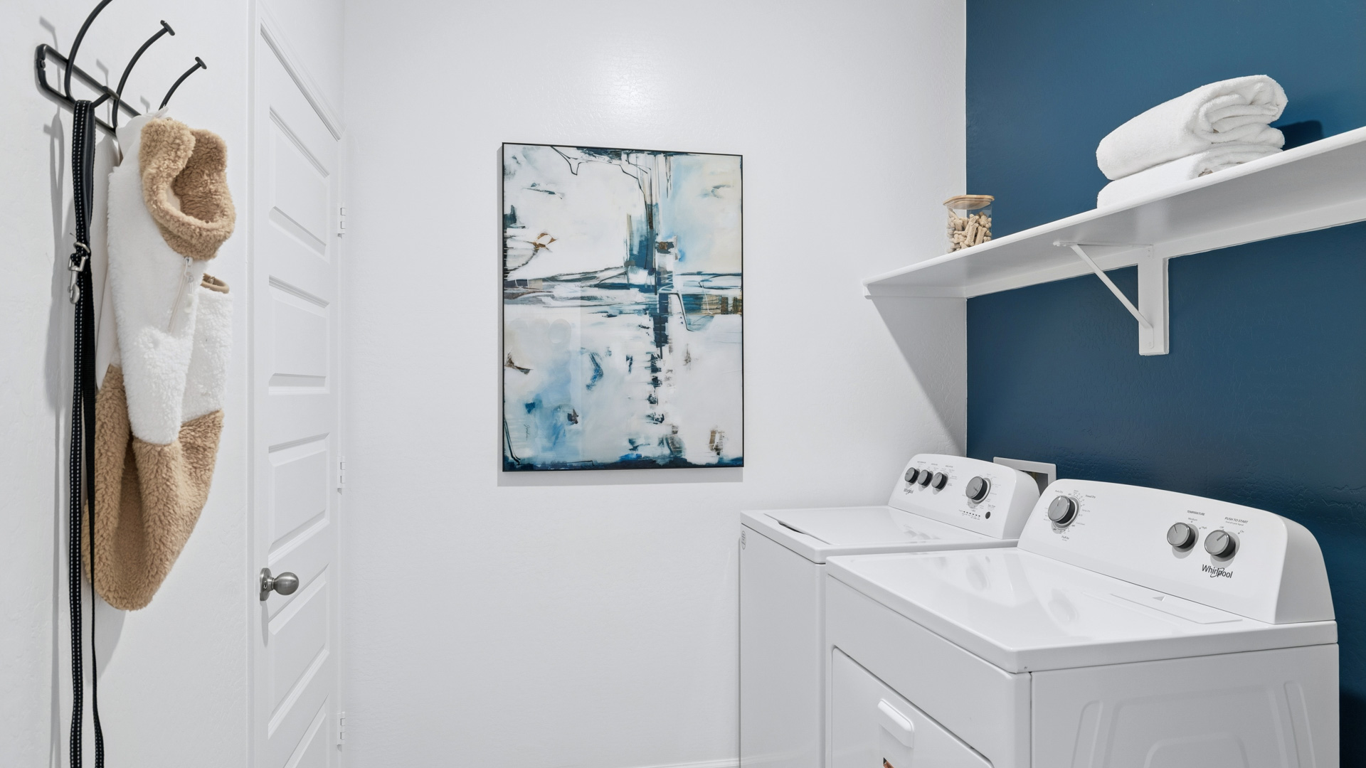 laundry room with shelving