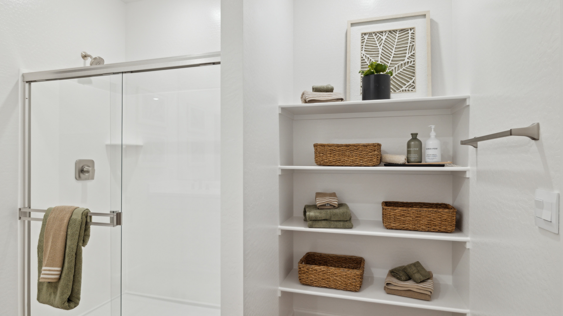 primary bathroom with dual vanities