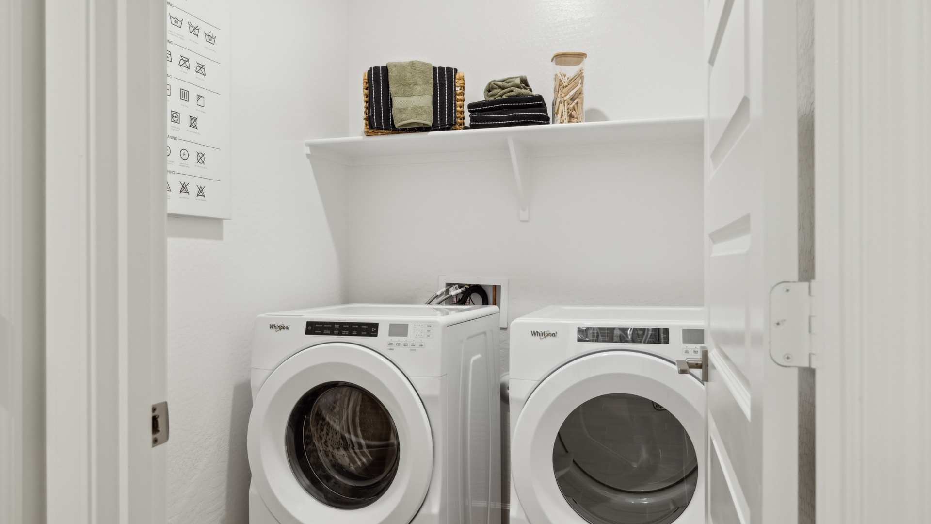 laundry room with shelving