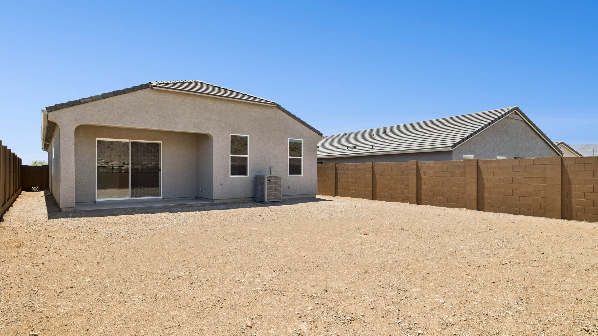 back of new home and covered patio