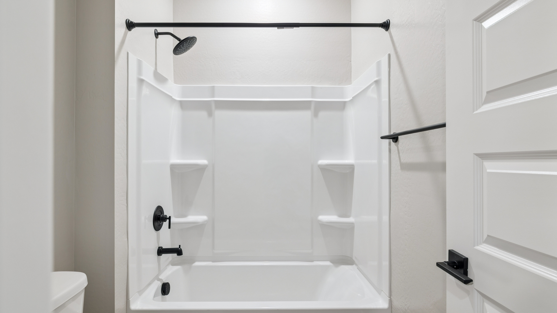 guest bathroom with bathtub.
