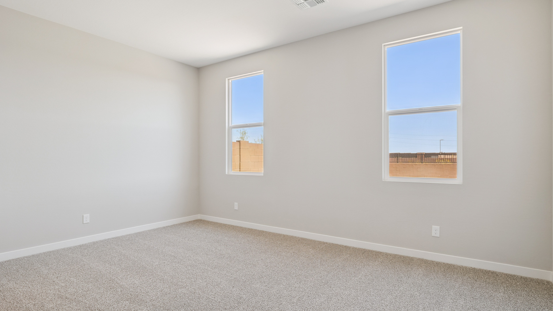 primary suite with walk in closet