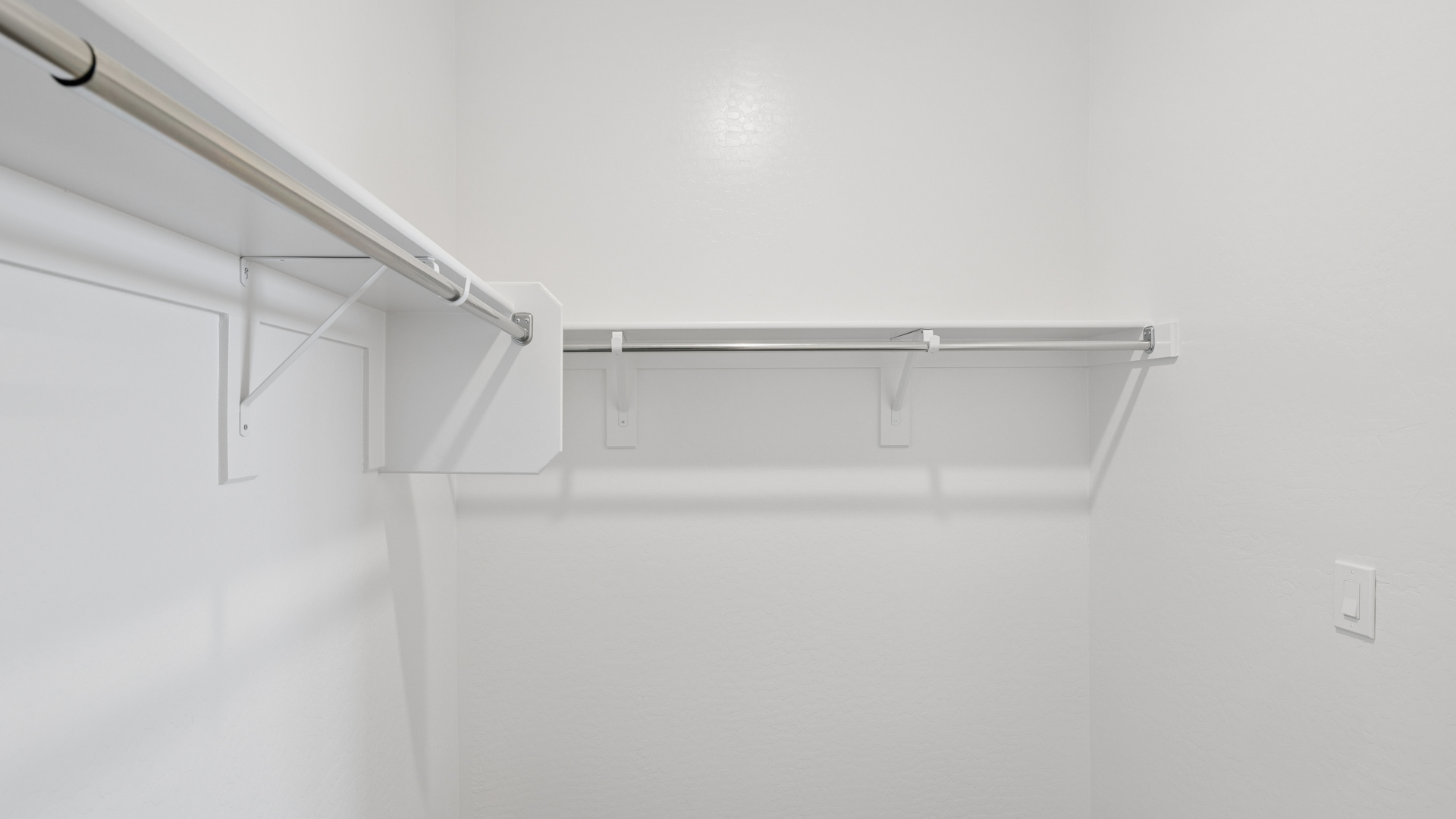 primary suite with walk in closet