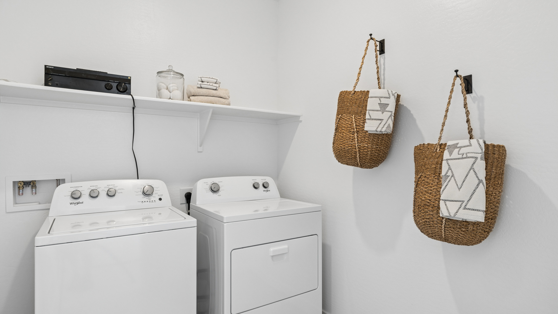 laundry room with shelving
