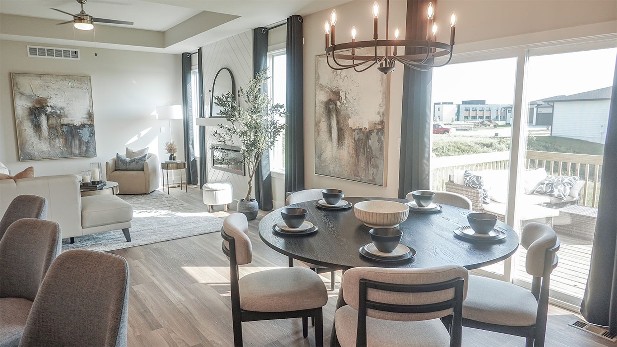 Open concept dining space with access to backyard