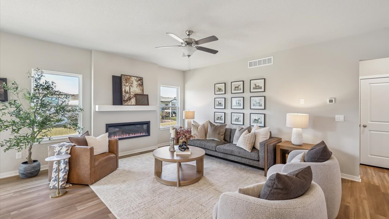 bright and spacious reagan living room with electric fireplace