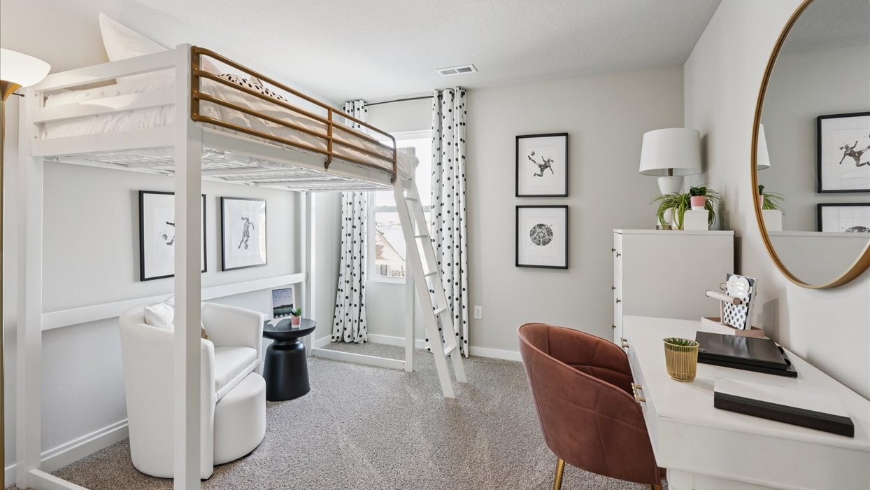 second bedroom with bunk bed and desk