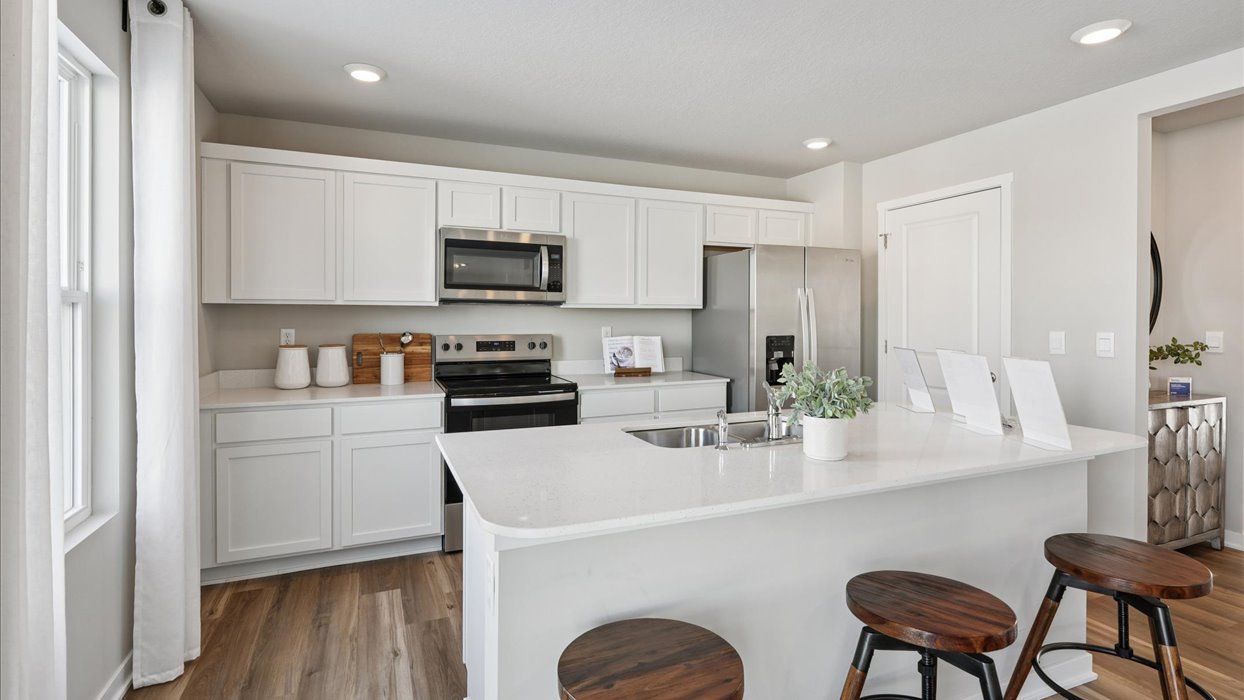 kitchen with quartz countertops and island