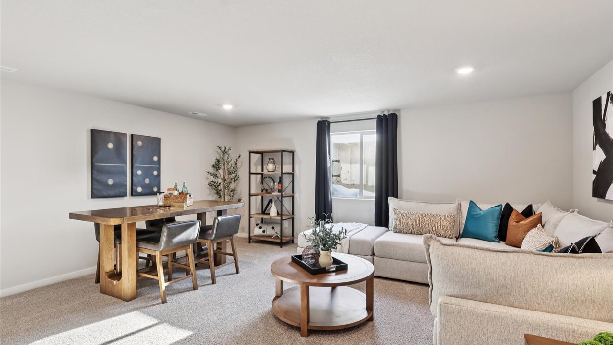 finished basement with couch and furniture