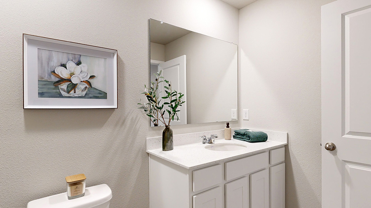 Bathroom with tub and shower combo, quartz countertops, and white vanity