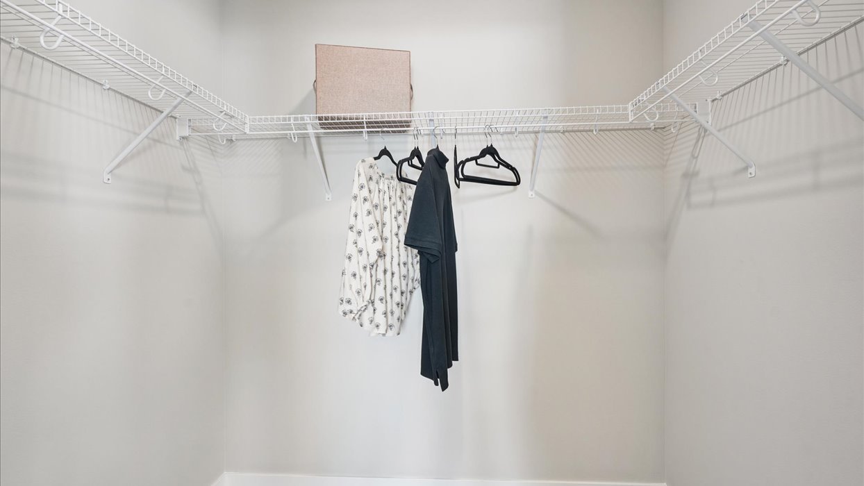 Spacious walk-in closet offering ample room for clothing, accessories, and everyday essentials.