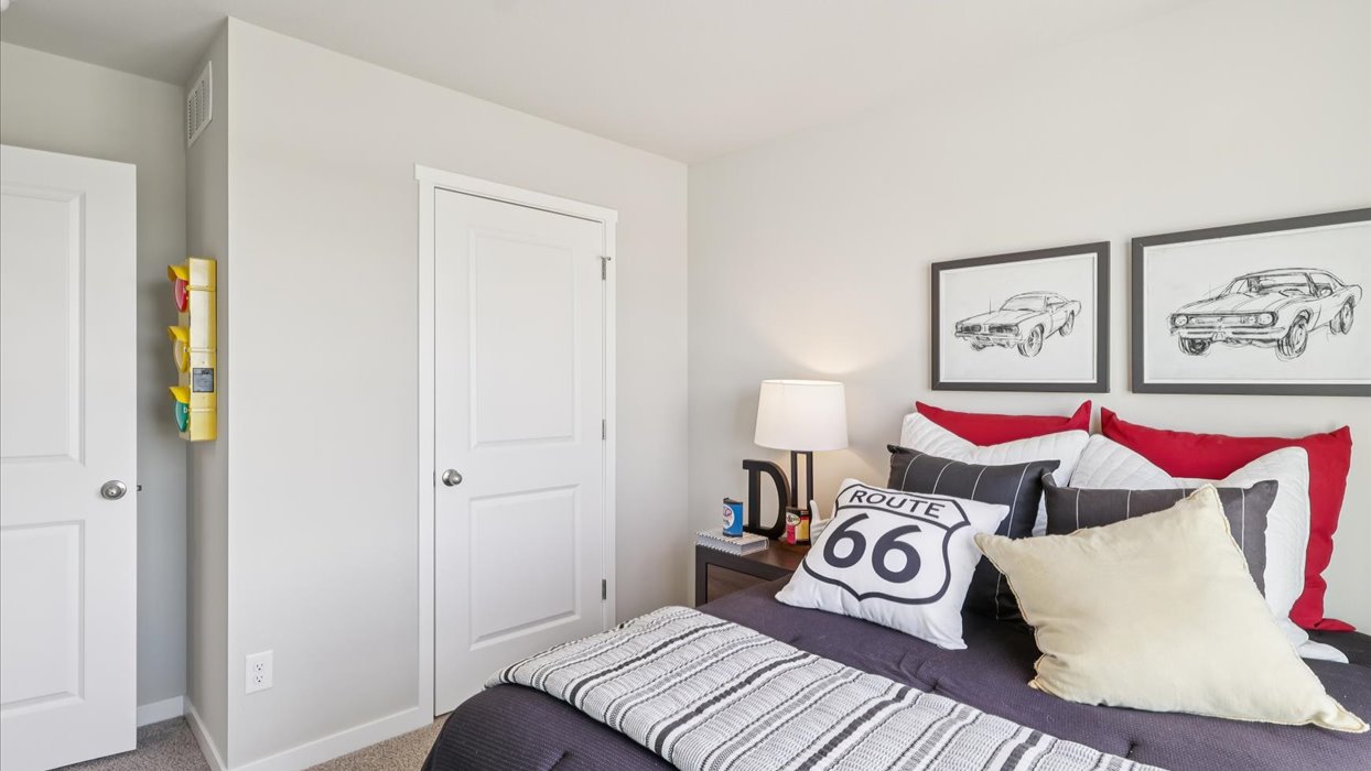 Comfortable secondary bedroom with natural light, modern finishes, and versatile living space.