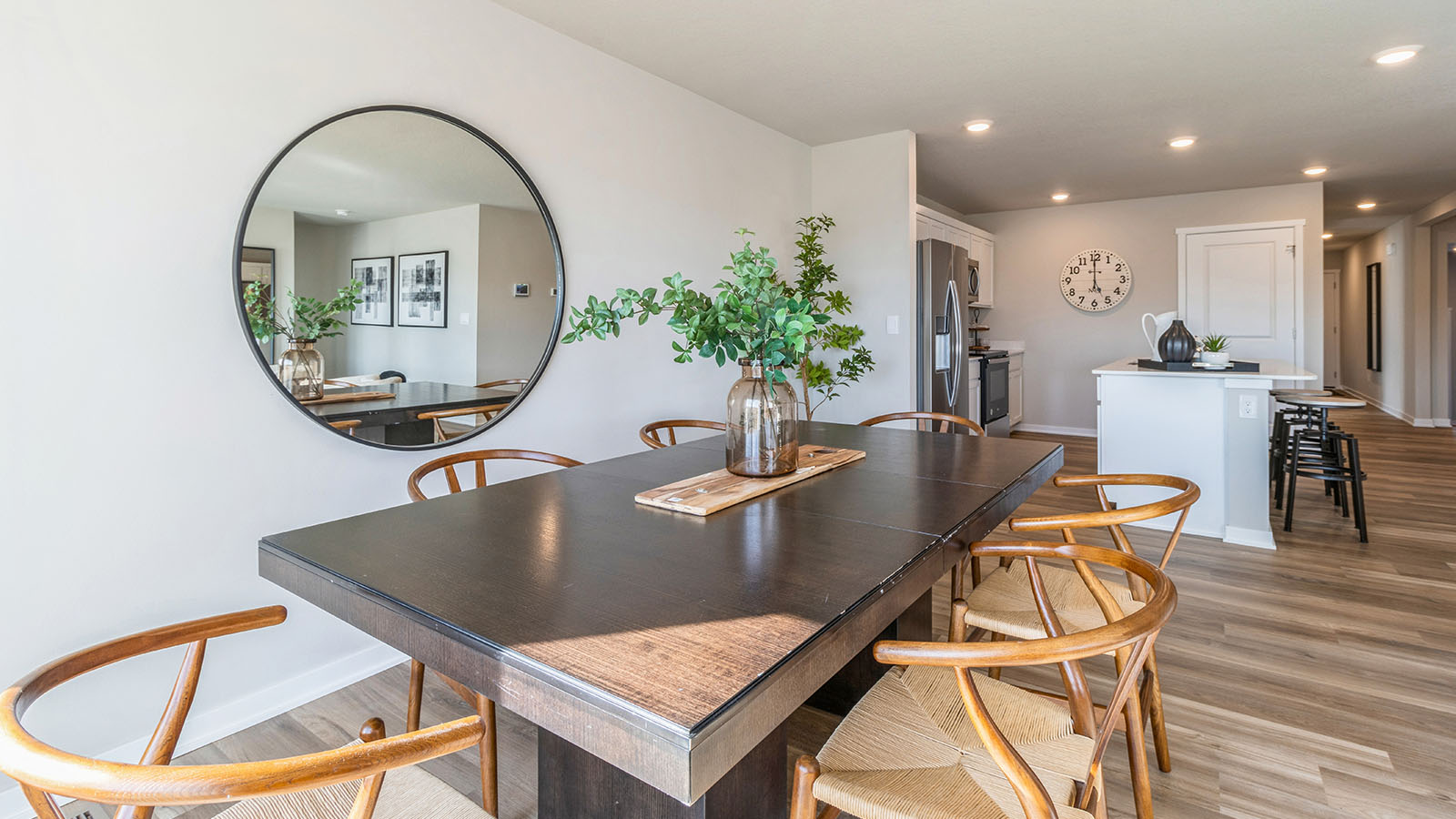 Open concept dining space with access to backyard