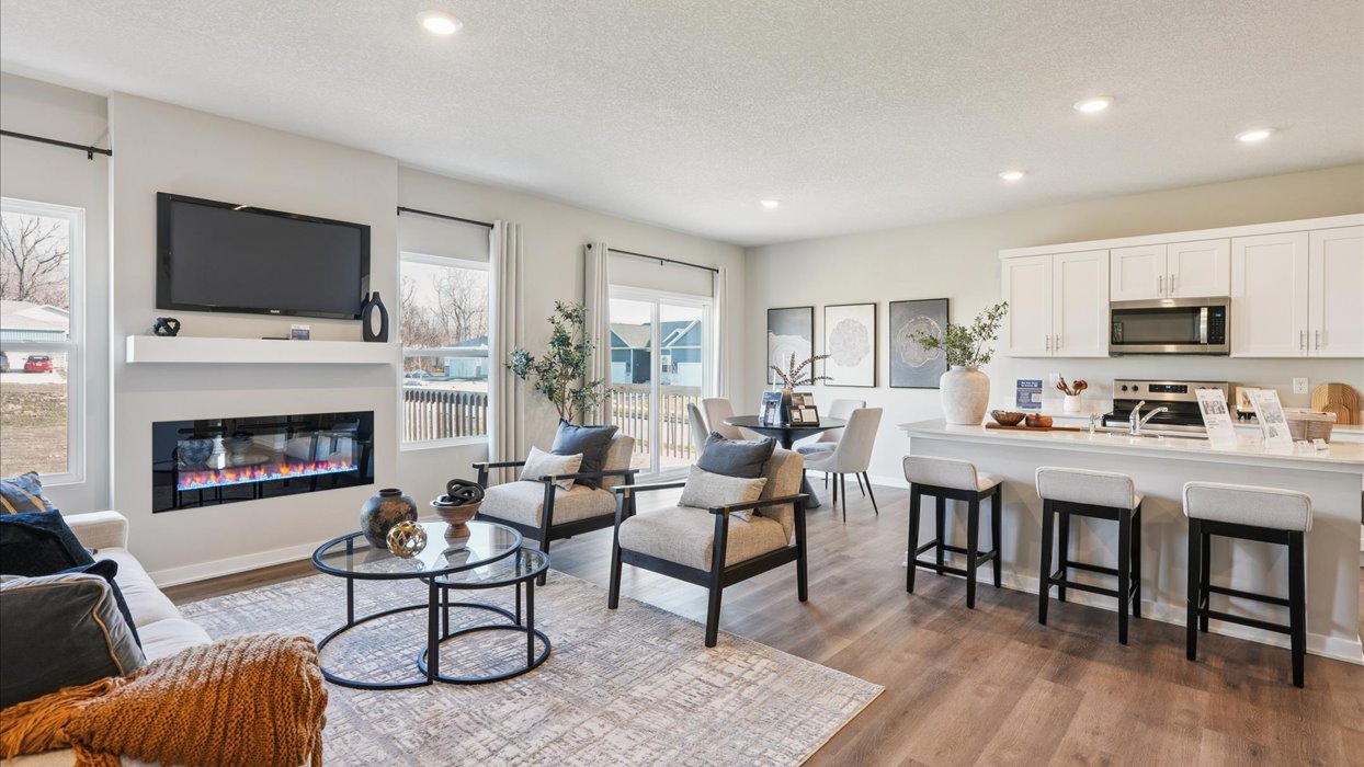 Open concept living room with electric fireplace