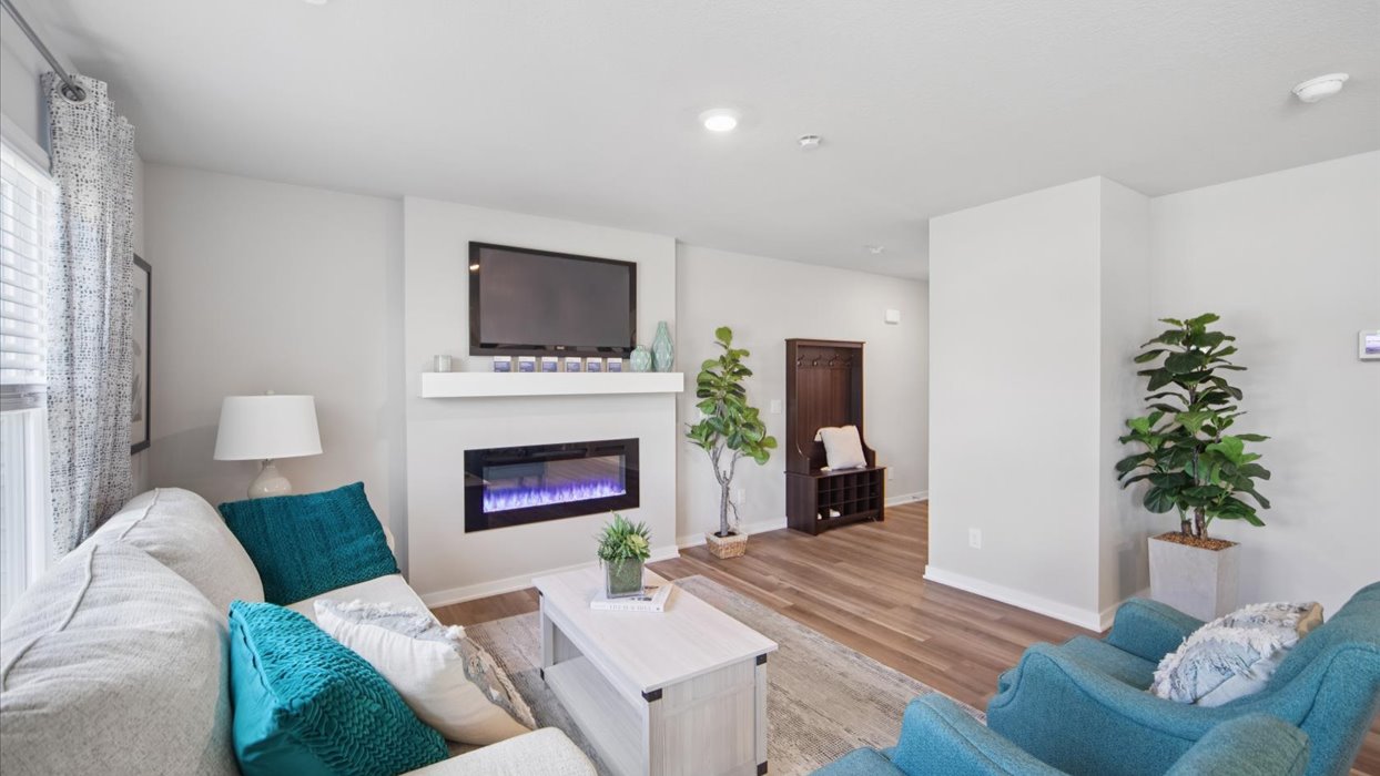Open concept living room with electric fireplace