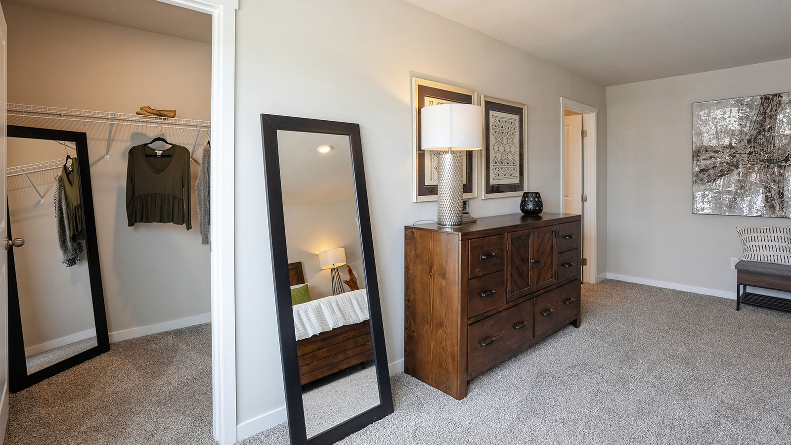Primary bedroom with natural lighting and spacious layout