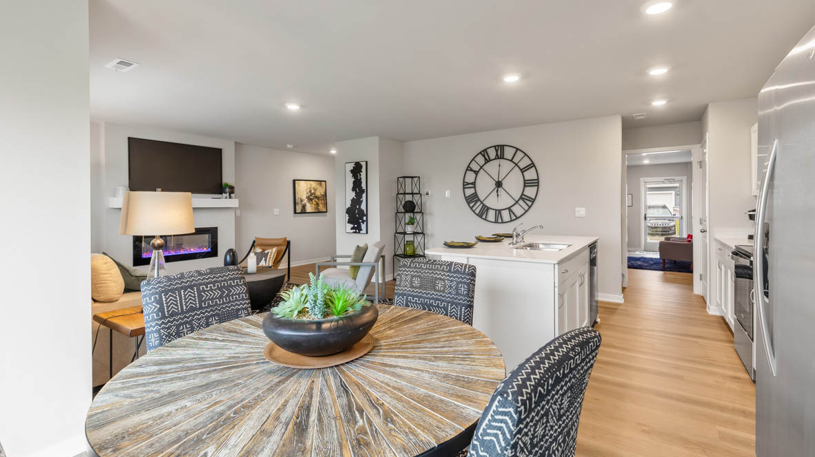 Open concept dining space with access to backyard