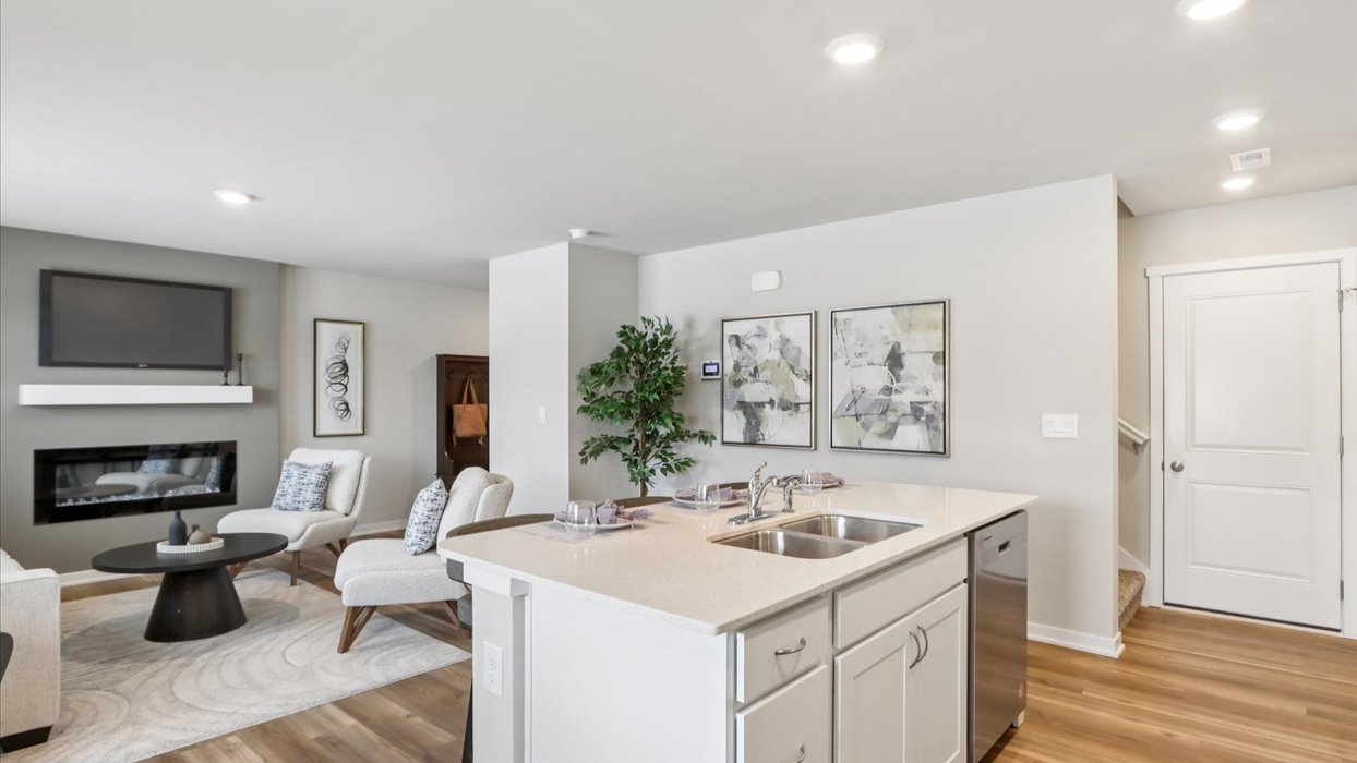 Kitchen with white cabinetry and quartz countertop