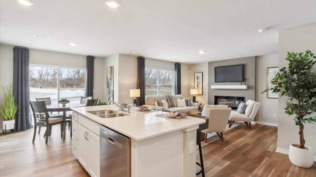 Kitchen with white cabinetry and quartz countertop