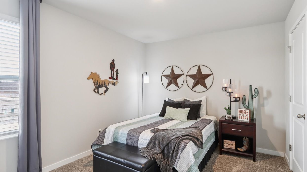 Comfortable secondary bedroom with natural light, modern finishes, and versatile living space.Comfortable secondary bedroom with natural light, modern finishes, and versatile living space.
