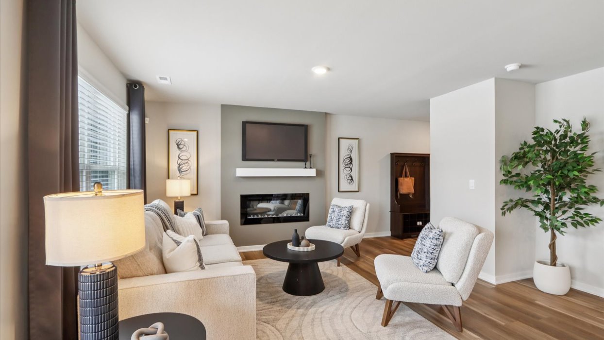 Open concept living room with electric fireplace