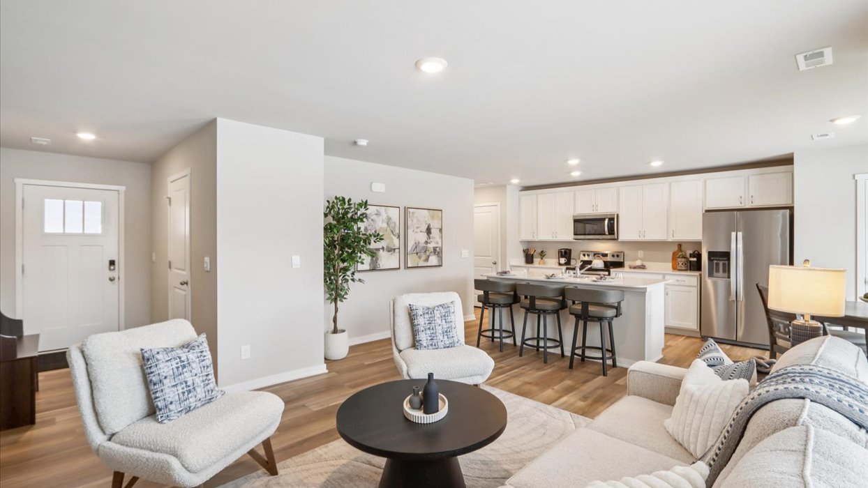 Open concept living room with electric fireplace