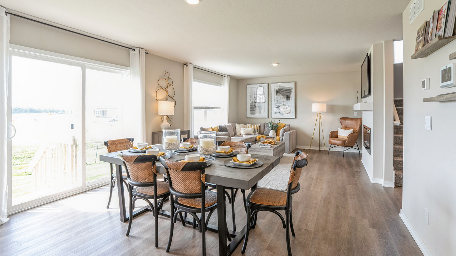 Open concept dining space with access to backyard