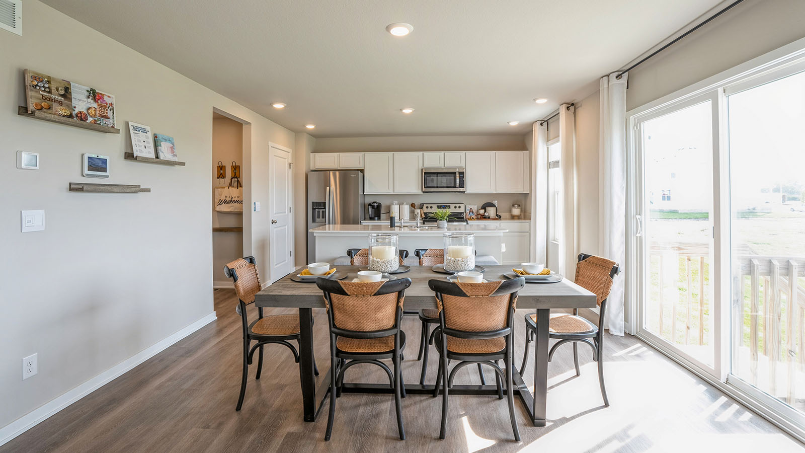 Open concept dining space with access to backyard