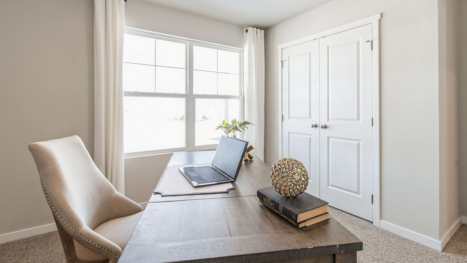 Comfortable secondary bedroom with natural light, modern finishes, and versatile living space.