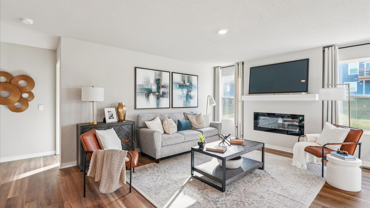 Open concept living room with electric fireplace