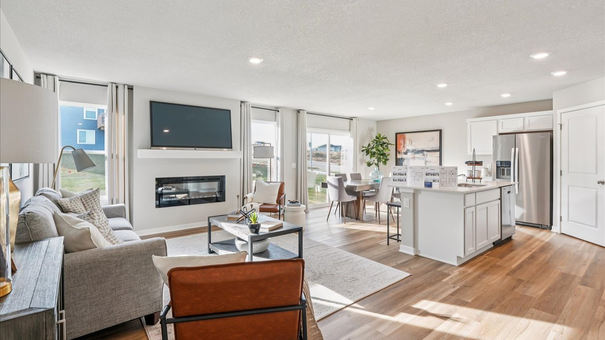 Open concept living room with electric fireplace