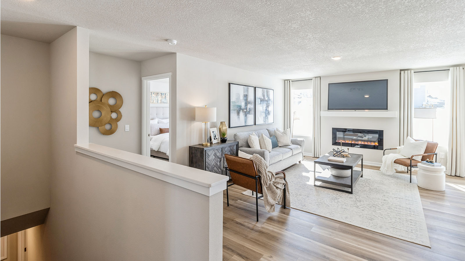 Open concept living room with electric fireplace