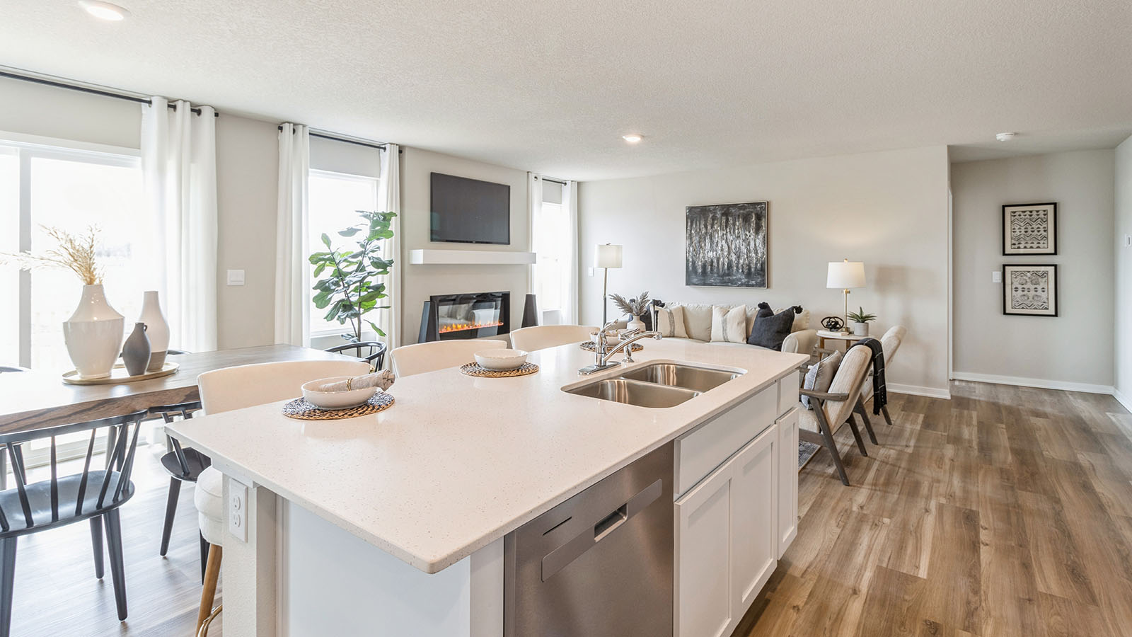 Kitchen with white cabinetry and quartz countertop