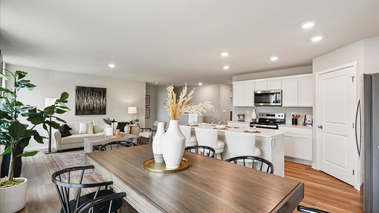 Open concept dining space with access to backyard