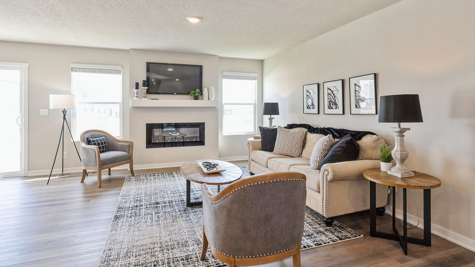 Open concept living room with electric fireplace