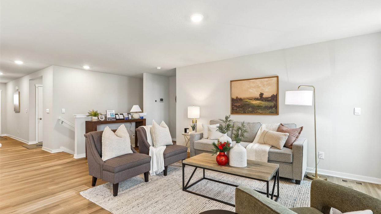Open concept living room with electric fireplace