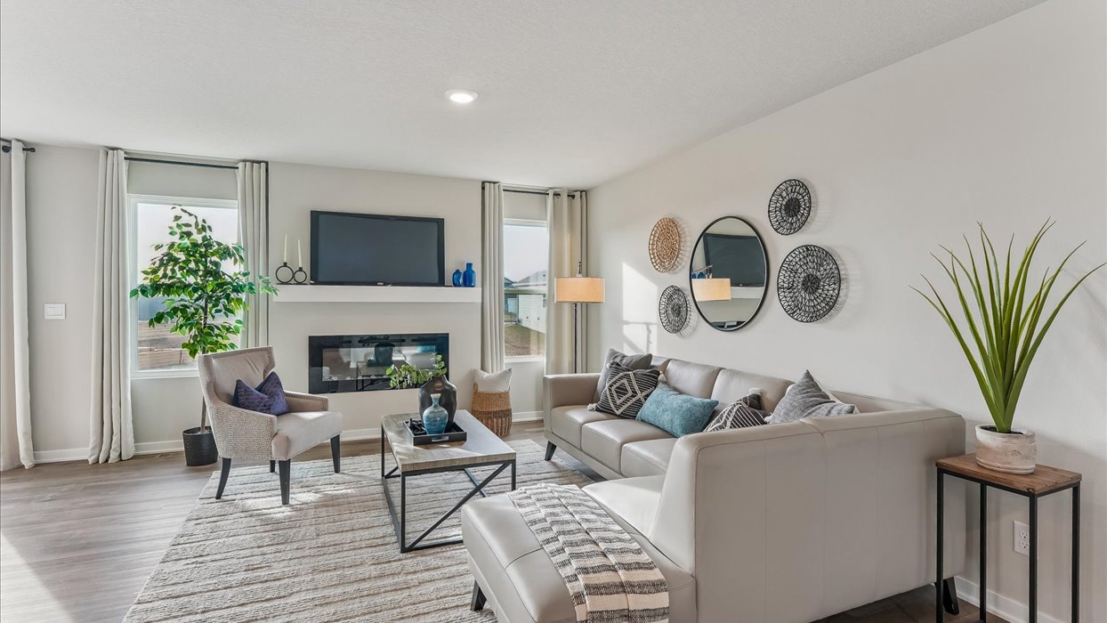 Open concept living room with electric fireplace