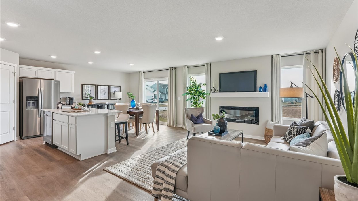 Open concept living room with electric fireplace