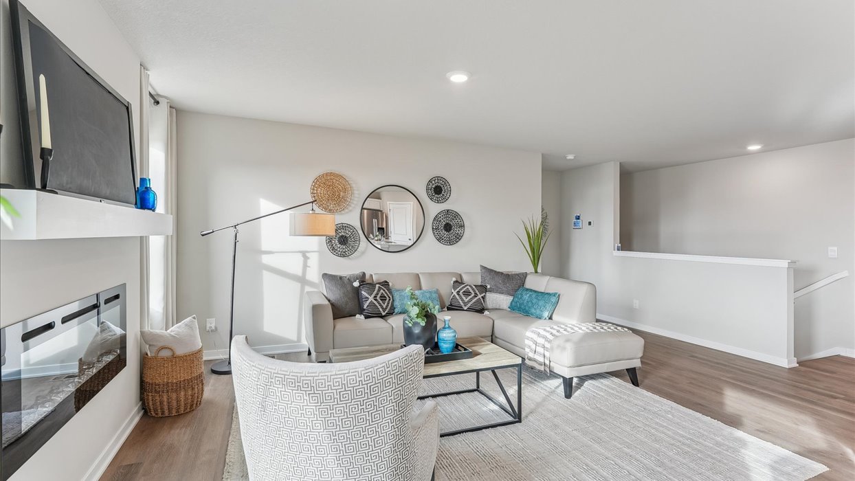 Open concept living room with electric fireplace